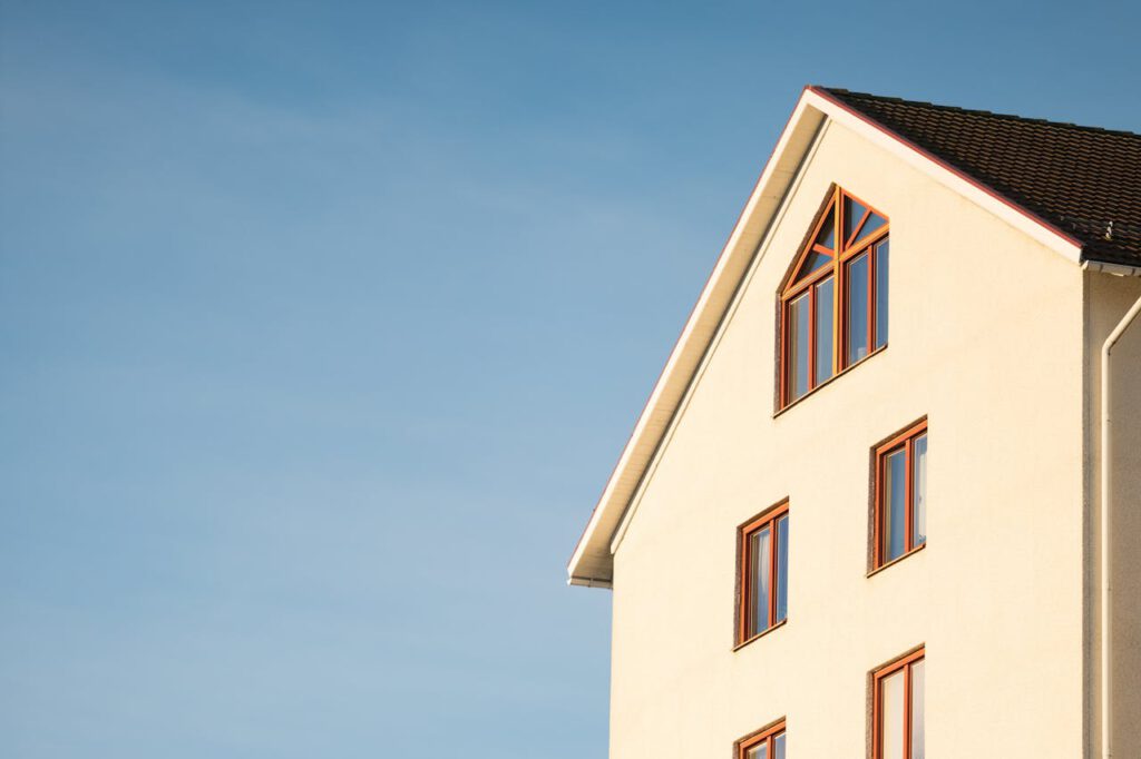 pexels-photo-358636 Beige Concrete House Under Cumulus Cloud